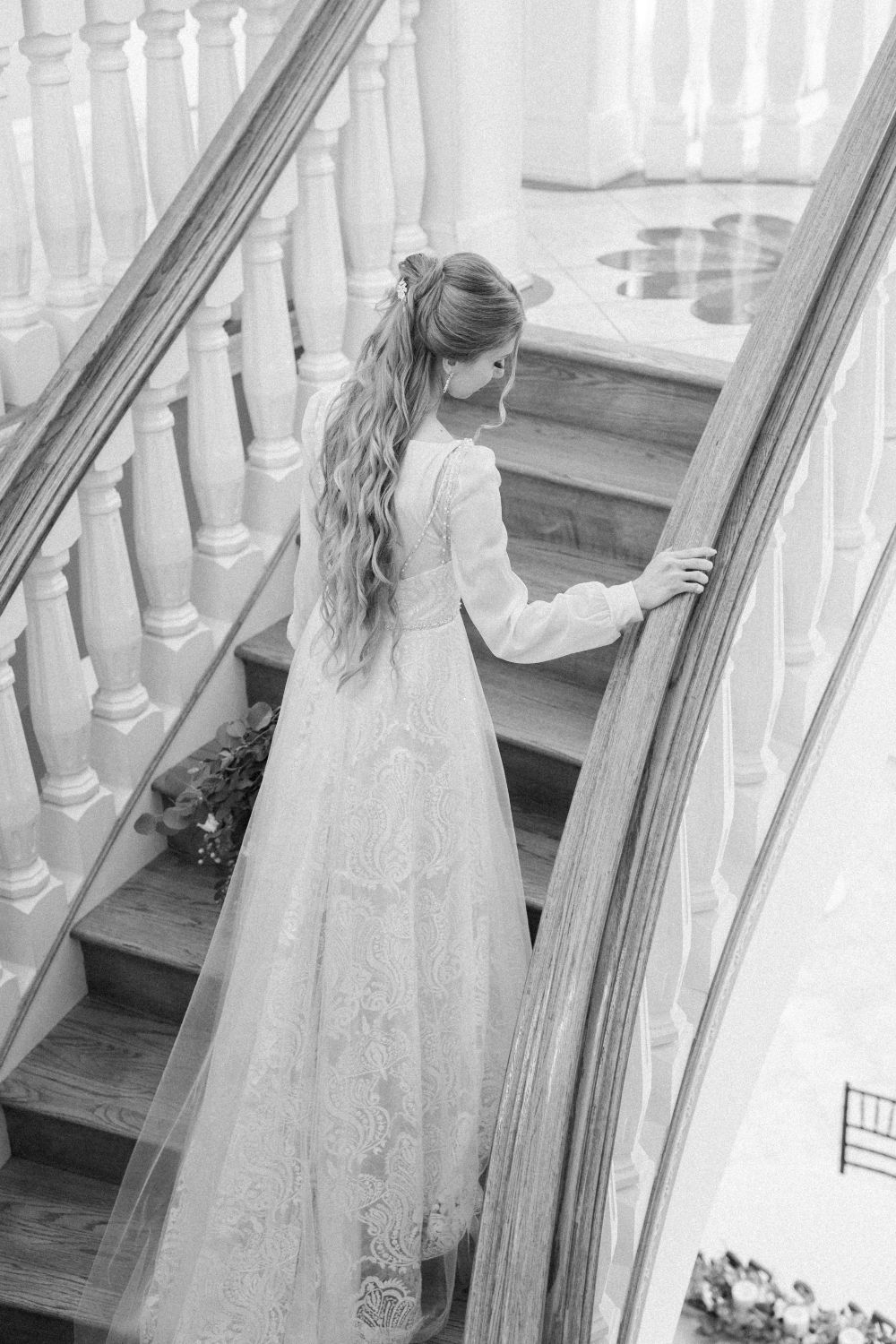 Bride ascending the grand staircase